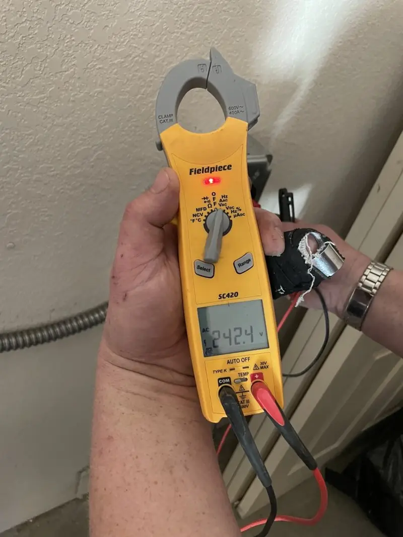 Voltage testing with clamp meter during Electrical Installation Services in Eastvale
